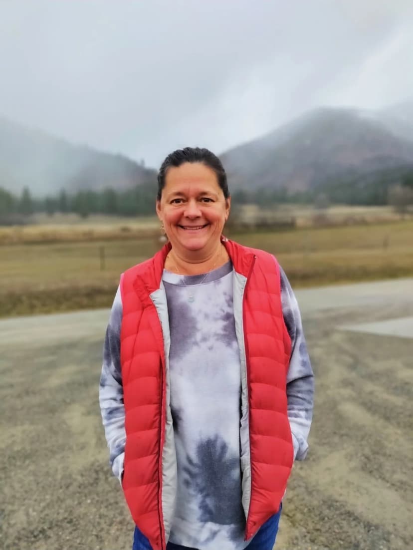 Tanya Bos, artist and founder of Purple Poppy Studio, outdoors in the Idaho mountains